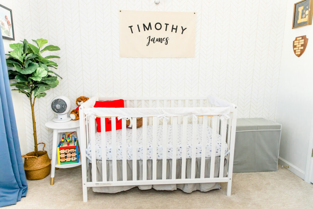 A family prepared their home for their newborn lifestyle session by cleaning up the baby's nursery with a crib
